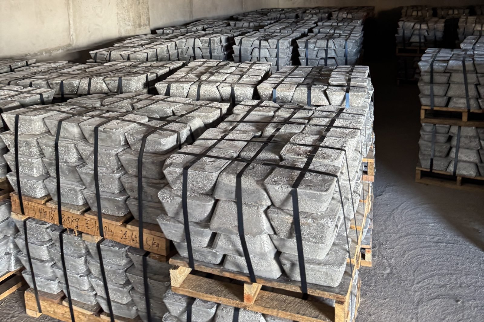 Palletized antimony ingots strapped for shipment